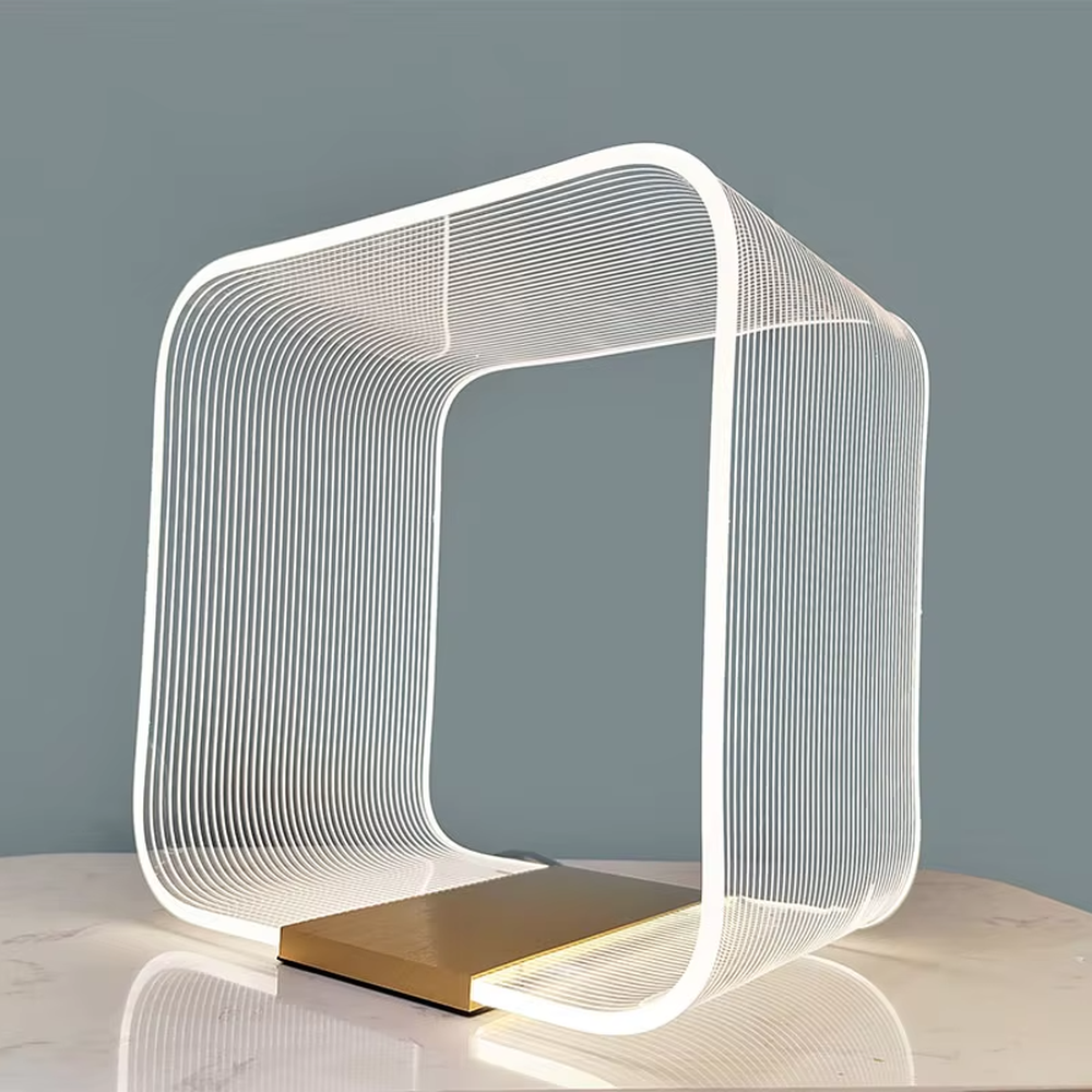 Avant-garde line frame table lamp (white line frame + gold base), warm light effect, creating a futuristic high-end space atmosphere.