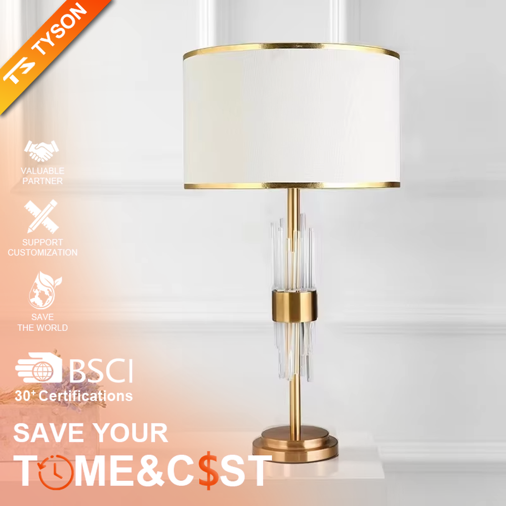 Light luxury style crystal and metal segmented table lamp, featuring transparent crystal columns paired with gold metal accessories, and an off-white fabric lampshade with a gold trim at the bottom. It emits soft and warm light, combining decorativeness and practicality, suitable for lighting and decoration in spaces such as bedroom nightstands, living room side tables, and hotel guest rooms.
