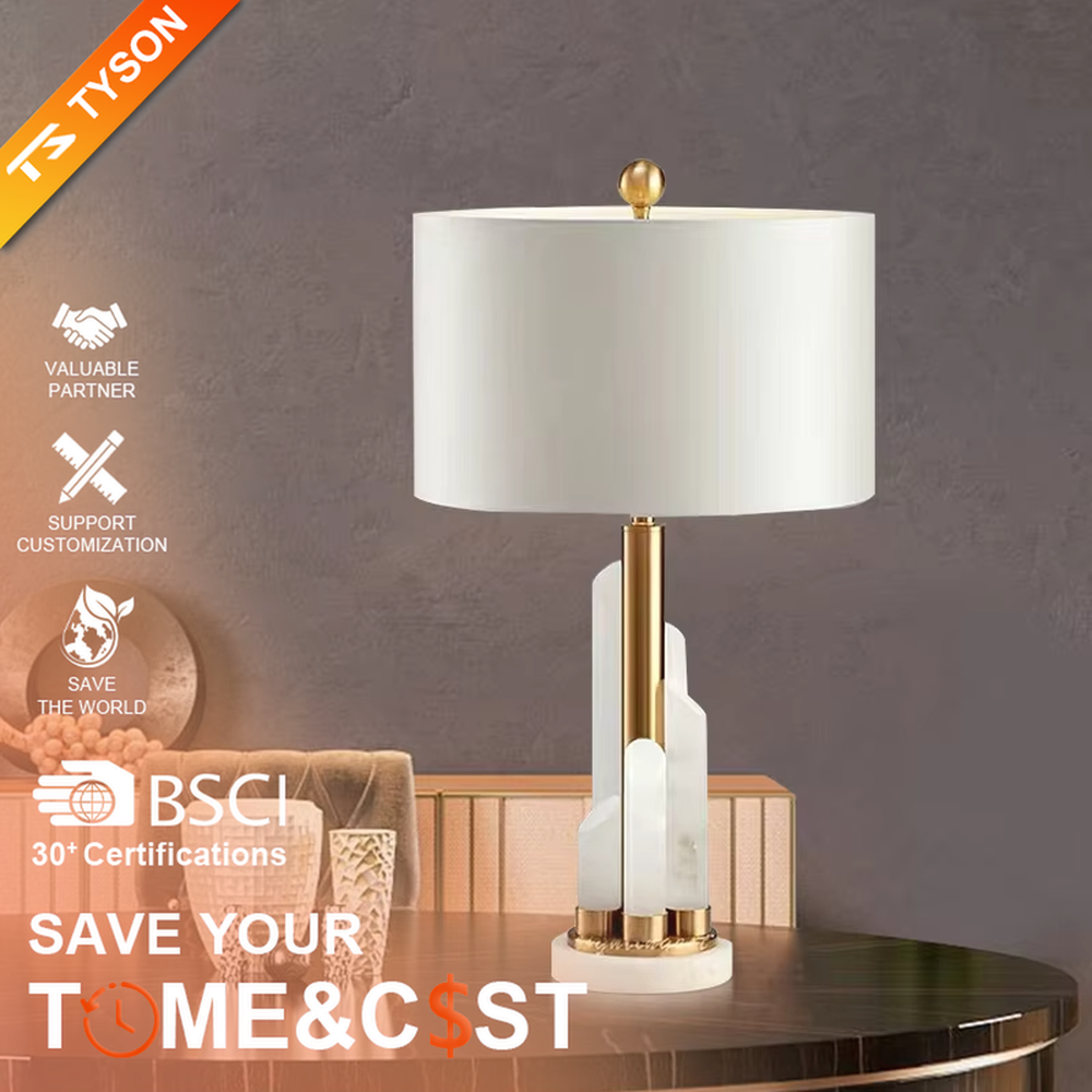 Light luxury crystal stone gold accessory table lamp (crystal column + gold accessories + marble base), warm light effect, creating an elegant and high-end home atmosphere.