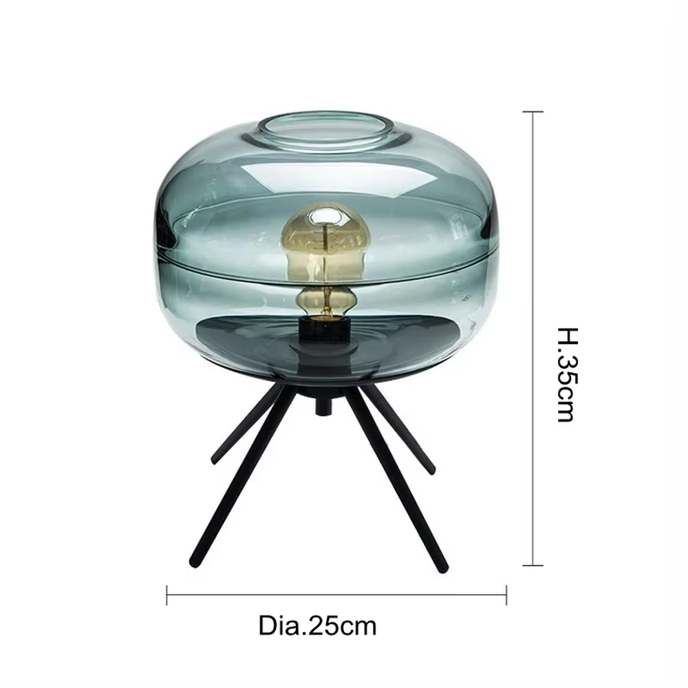 Light luxury dark green glass ball table lamp (dark green double-layer glass ball + black triangular stand), warm light effect, creating a fresh and high-end home atmosphere.