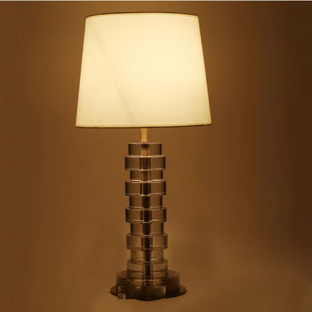 Light Luxury Stacked Acrylic Table Lamp (Off-white Fabric Umbrella Lampshade + Transparent Acrylic Stacked Lamp Post + Gold Metal Base), warm light effect, creating an exquisite and elegant home atmosphere.