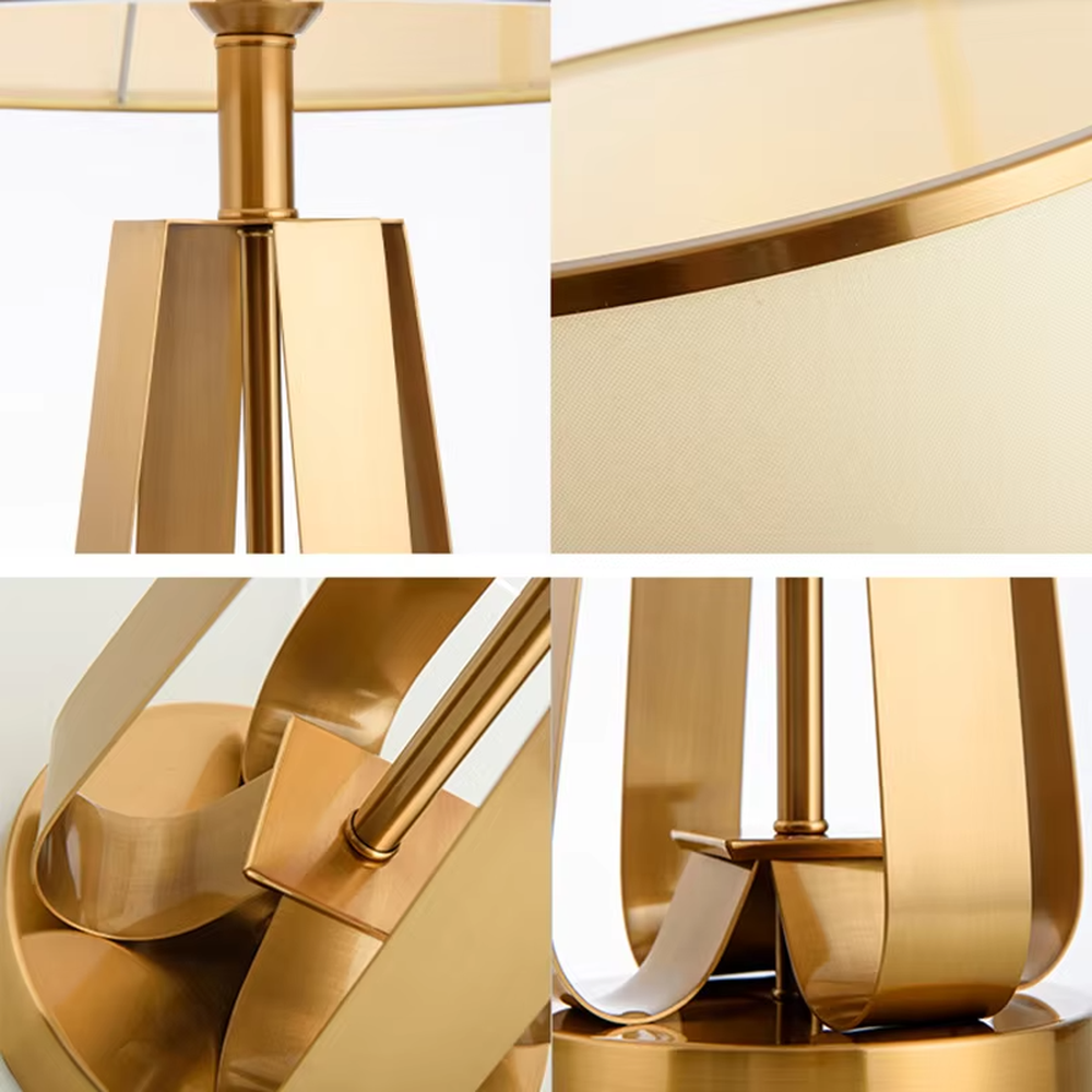 This is a light luxury geometric metal table lamp, featuring a gold polygonal hollow lamp base paired with an off-white fabric lampshade (with gold trim). It emits soft and warm light, serving both lighting and decorative purposes, suitable for bedroom nightstands, light luxury living room side tables, hotel guest rooms, showrooms and other scenarios.