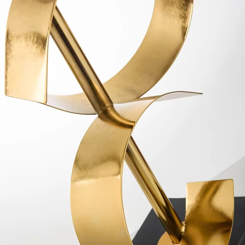 Light luxury golden spiral-shaped table lamp, golden spiral stand + black square base + gradient gray fabric lampshade, soft warm light, creating an elegant light luxury bedroom atmosphere.