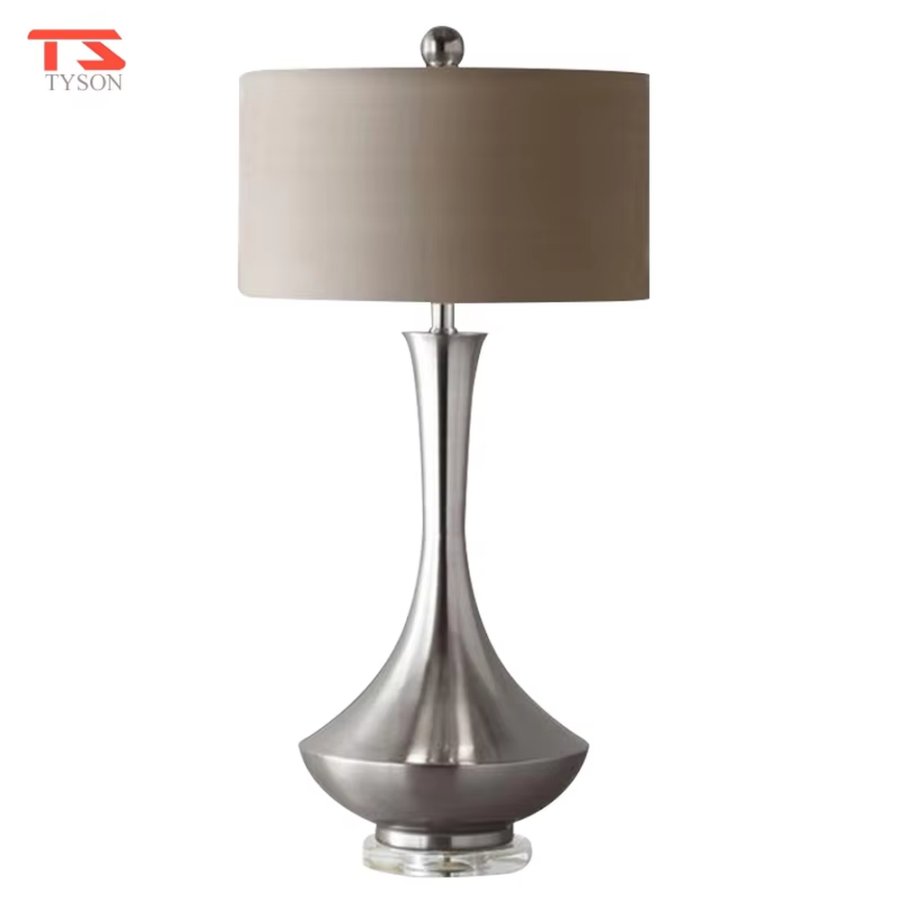 Modern minimalist silver bottle-shaped metal pole light beige fabric shade table lamp, warm light effect, creating an elegant light luxury home atmosphere.