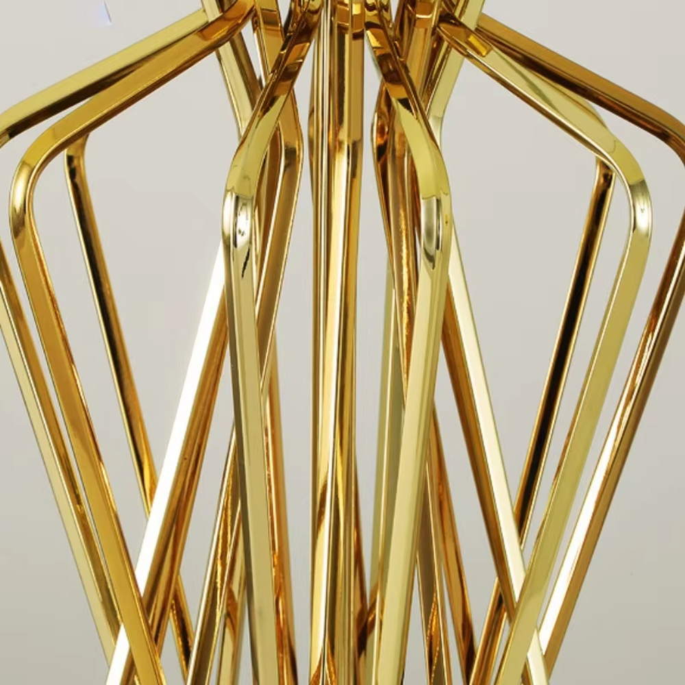 Modern art golden geometric line table lamp (white shade + black base), warm light effect, creating a high-end minimalist creative space atmosphere.