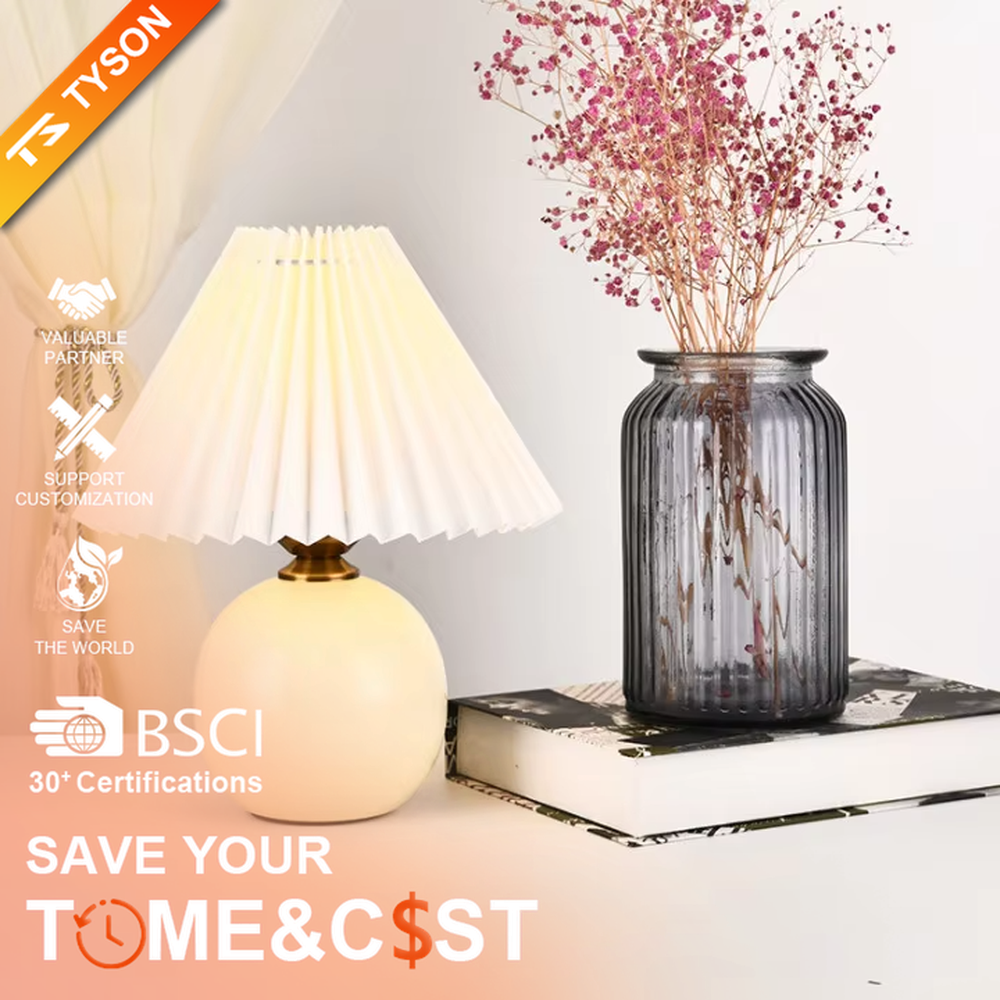 Fresh pleated umbrella shade table lamp (cream yellow glaze ball body + white pleated shade), warm light effect, creating a soft and healing home atmosphere.