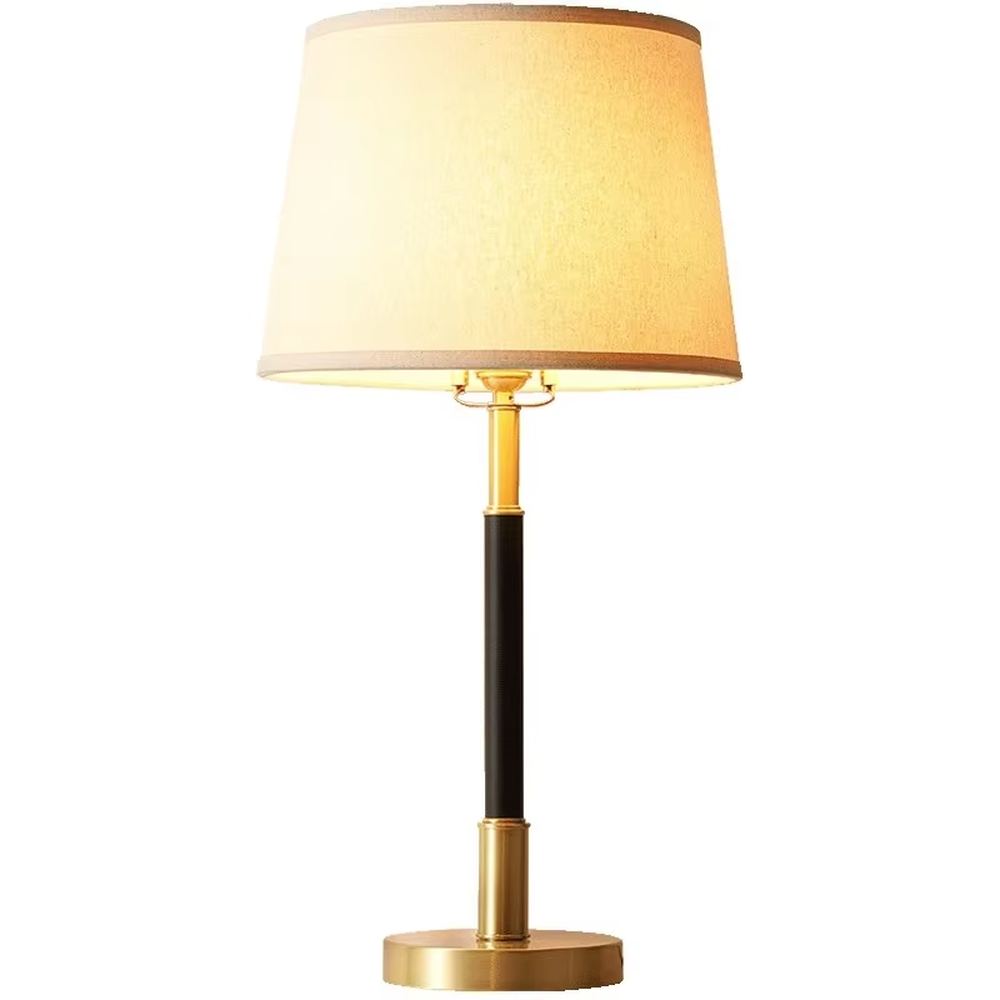 This table lamp features a black and gold contrasting metal lamp pole paired with an off-white fabric lampshade, with a glossy gold metal base. It presents a style that combines modern light luxury and minimalist retro, with soft eye-protective light, serving both lighting and decorative purposes, suitable for placement in bedrooms, studies and other spaces.