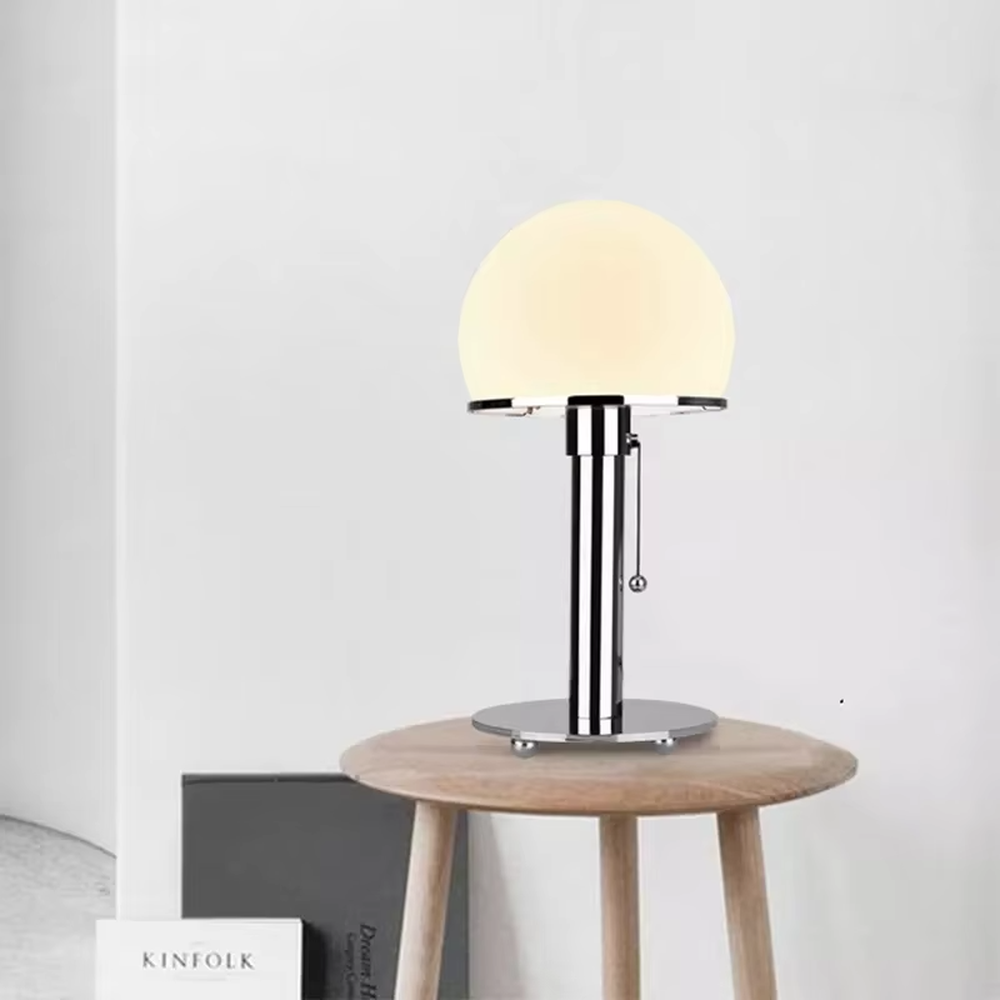 Modern minimalist chrome-plated metal spherical table lamp, milk-white spherical lampshade + glossy metal stand + warm light effect, creating a fresh minimalist home atmosphere.