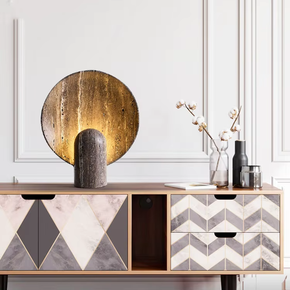 Industrial retro stone-texture base + circular metal texture lampshade table lamp, warm light effect, creating a rustic artistic atmosphere.