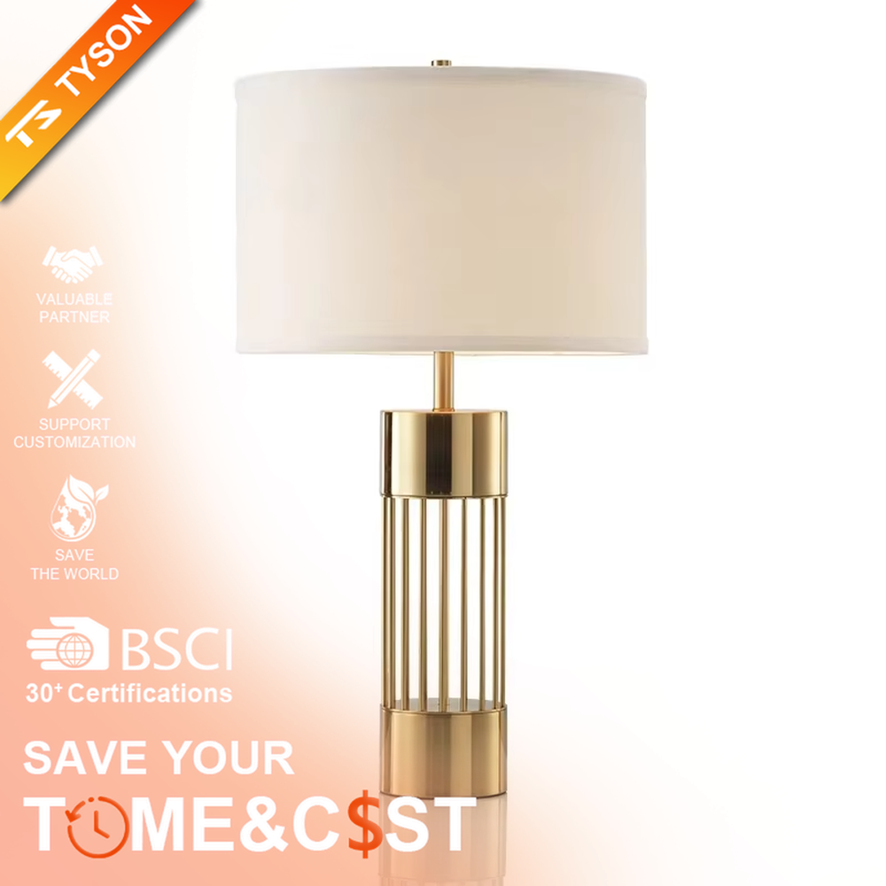 Light luxury gold grid cylinder table lamp (gold grid base + fabric lampshade), warm light effect, creating a high-end minimalist home atmosphere.