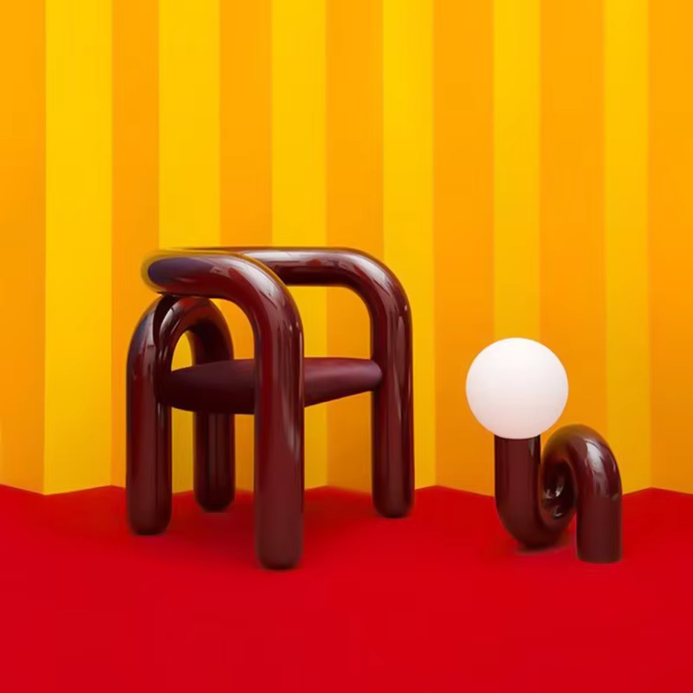 This art table lamp features a spiral S-shaped stand made of glossy wine-red material, paired with a milky white spherical lampshade, with a vivid and retro shape, serving both lighting and decorative purposes, ideal for bedrooms, living rooms, internet-famous shops and other spaces.