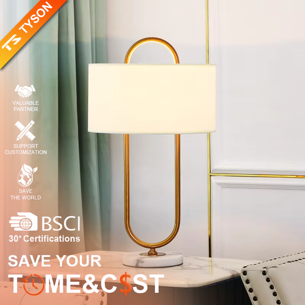 Light luxury U-shaped gold frame table lamp (gold ring stand + fabric shade + marble base), warm light effect, creating an elegant and high-end home atmosphere.