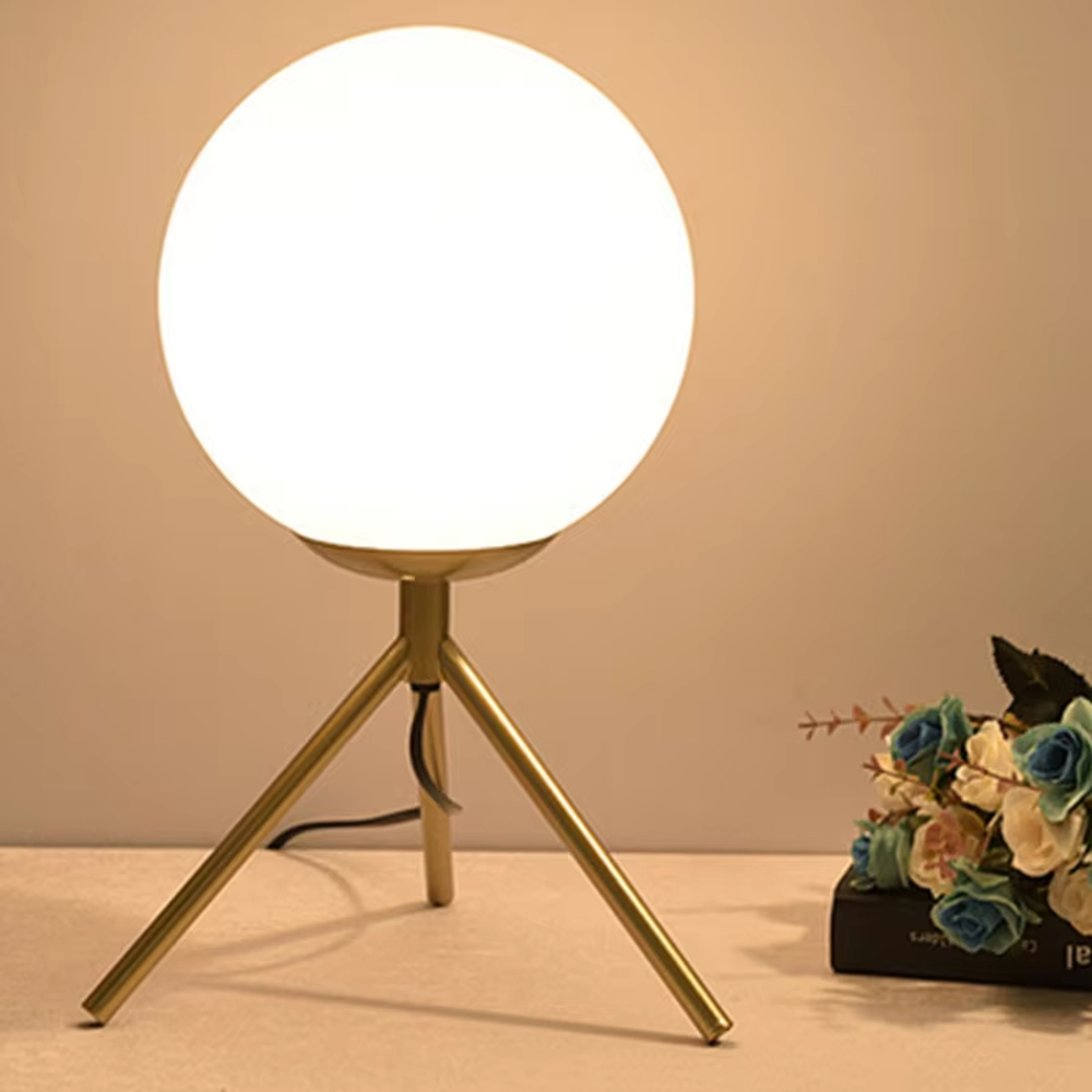 This is a modern minimalist metal frame table lamp, with a black oval metal stand paired with a white spherical frosted lampshade, featuring a simple and elegant design, both decorative and lighting functions, ideal for modern indoor scenarios such as desks and nightstands.