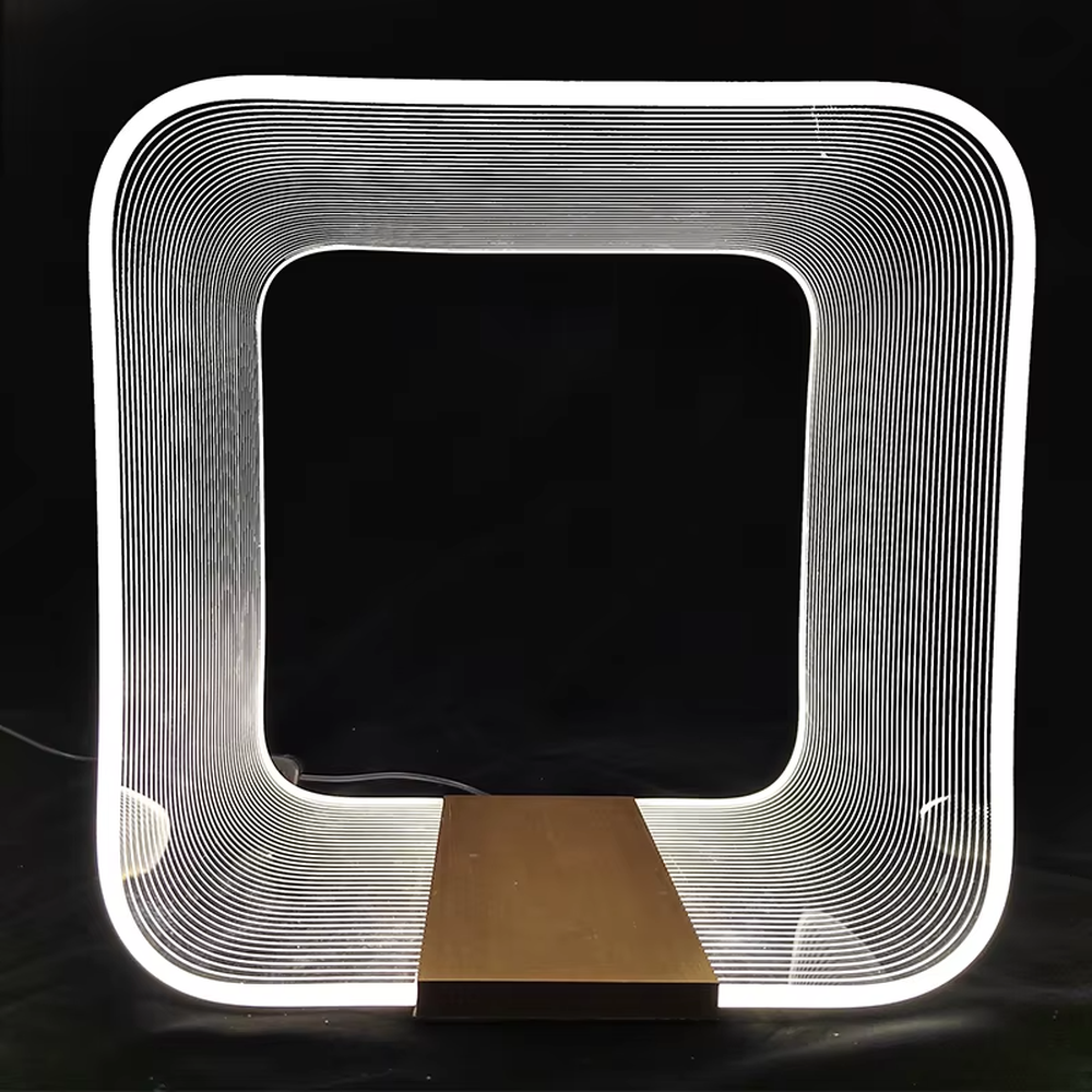 Avant-garde line frame table lamp (white line frame + gold base), warm light effect, creating a futuristic high-end space atmosphere.