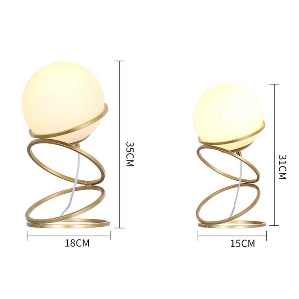 This is a light luxury spiral metal stand table lamp, with a gold spiral design paired with a white spherical frosted lampshade, featuring both decorative and lighting functions, ideal for modern indoor scenarios such as living room side tables and bedroom nightstands.
