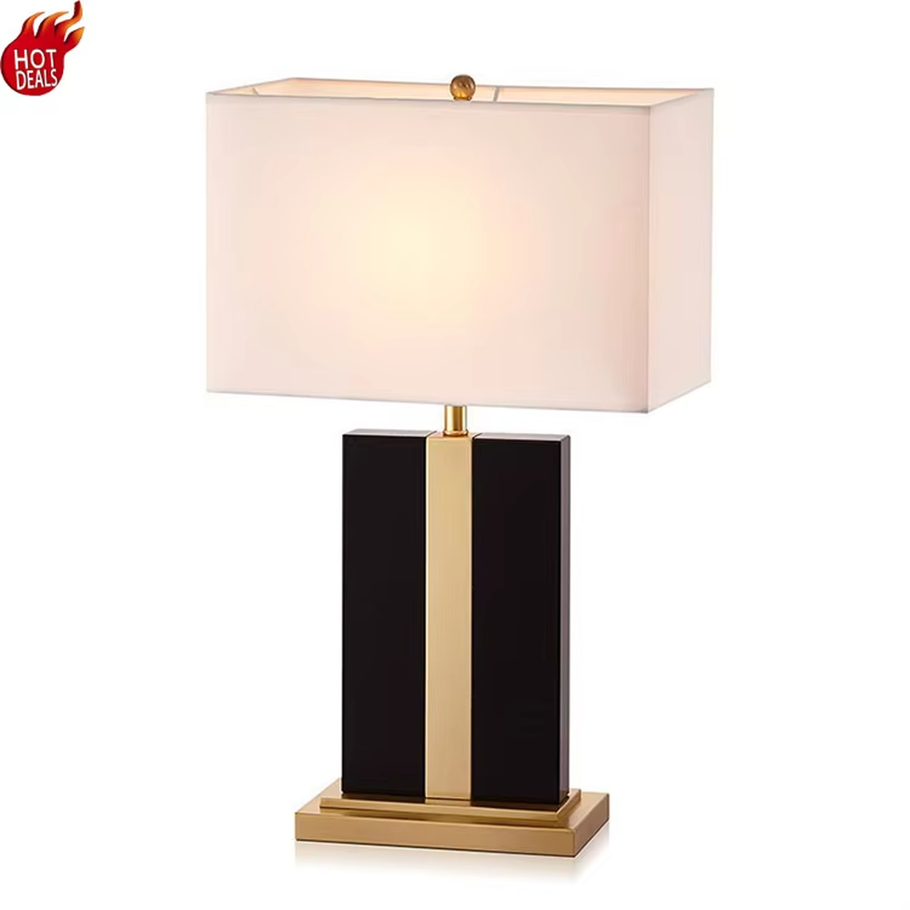 Light luxury color-blocking square base table lamp (black-gold color-blocking base + linen shade), warm light effect, creating a simple and high-end home atmosphere.