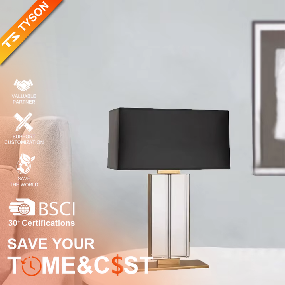 This is a modern light luxury crystal column table lamp, with a black rectangular fabric lampshade paired with a transparent cut crystal column base, accented with gold metal details, featuring both decorative and lighting functions, ideal for high-end indoor scenarios such as living room side tables and bedroom nightstands.