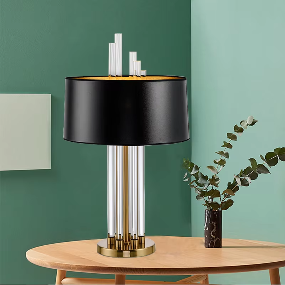 Modern Light Luxury Gold & Crystal Table Lamp, Black Cylindrical Fabric Lampshade (Gold Interior), Transparent Crystal Strips and Gold Metal Strips Combined Lamp Body with Crystal Decor on Top, Serves Both Lighting and Decorative Purposes, Ideal for Living Rooms, Bedrooms, Studies, Hotel Guest Rooms and Other Light Luxury Spaces.