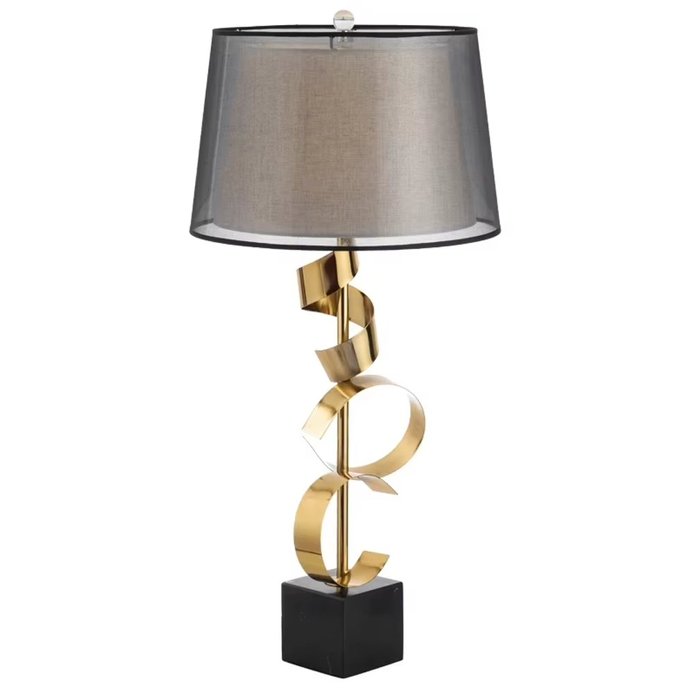 Light luxury golden spiral-shaped table lamp, golden spiral stand + black square base + gradient gray fabric lampshade, soft warm light, creating an elegant light luxury bedroom atmosphere.