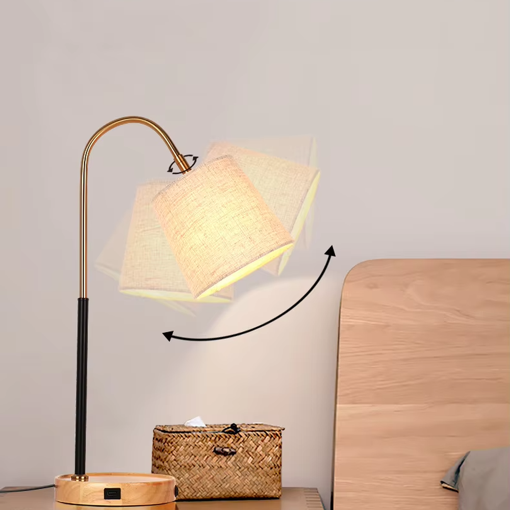 Light luxury wood-base curved arm table lamp (log base + black-gold curved arm + linen lampshade), warm light effect, creating a warm and high-end home atmosphere.