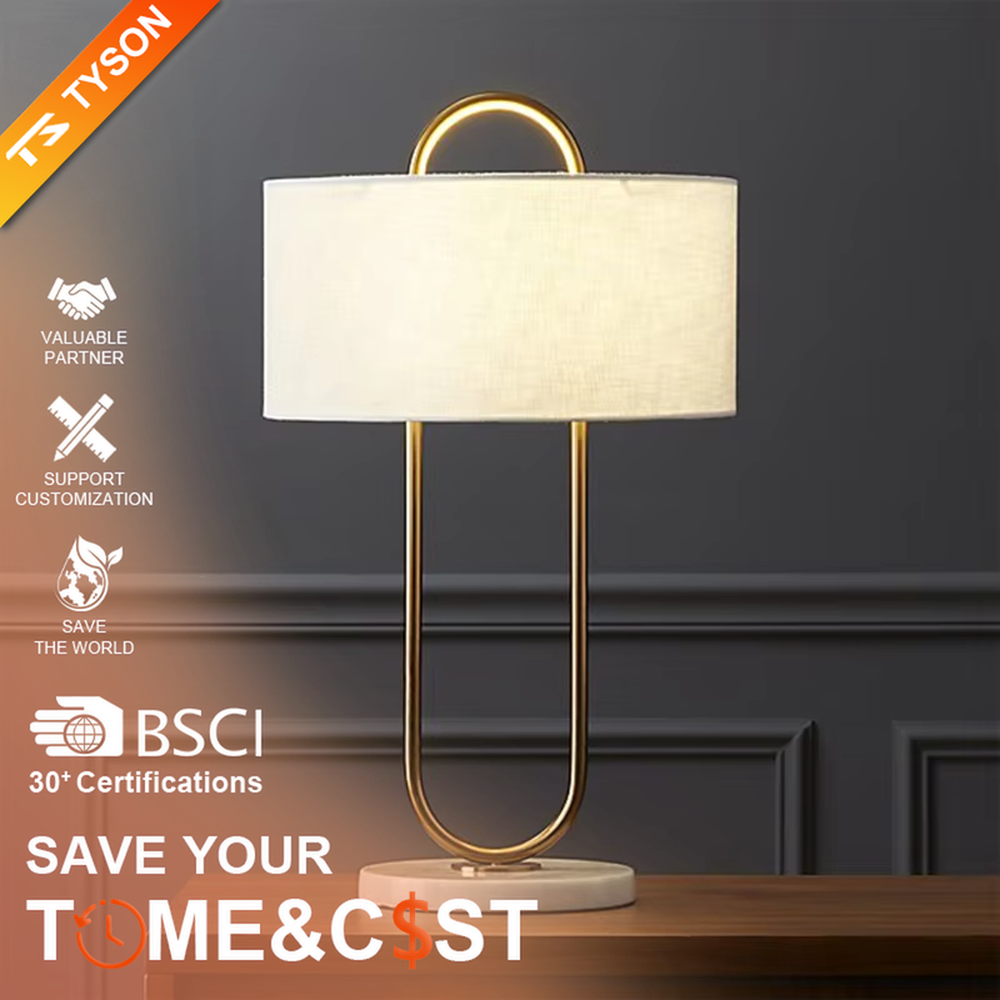 Light luxury U-shaped gold frame table lamp (gold U-shaped stand + fabric shade + marble base), warm light effect, creating an elegant and high-end home atmosphere.