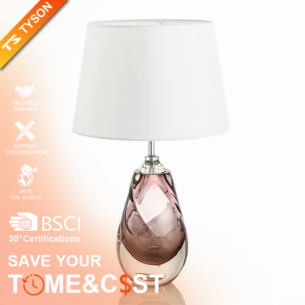 Modern art pink waterdrop glass base beige fabric shade table lamp, warm light effect, creating an elegant artistic atmosphere.