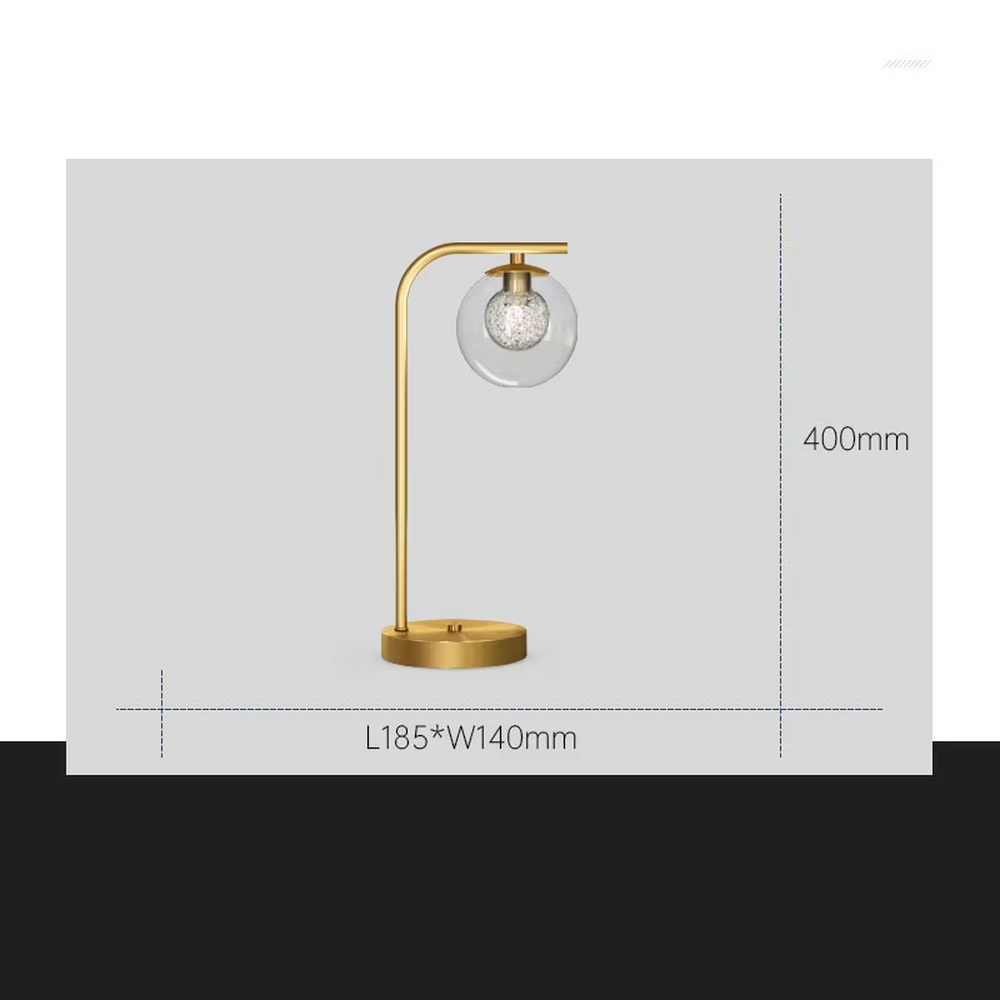 Modern light luxury golden curved pole transparent glass ball shade glitter bulb table lamp, warm light effect, creating a minimalist exquisite atmosphere.