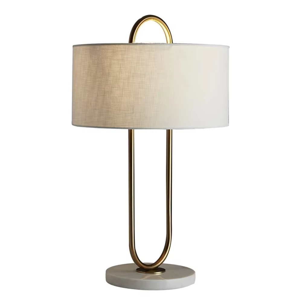 Light luxury U-shaped gold frame table lamp (gold ring stand + fabric shade + marble base), warm light effect, creating an elegant and high-end home atmosphere.