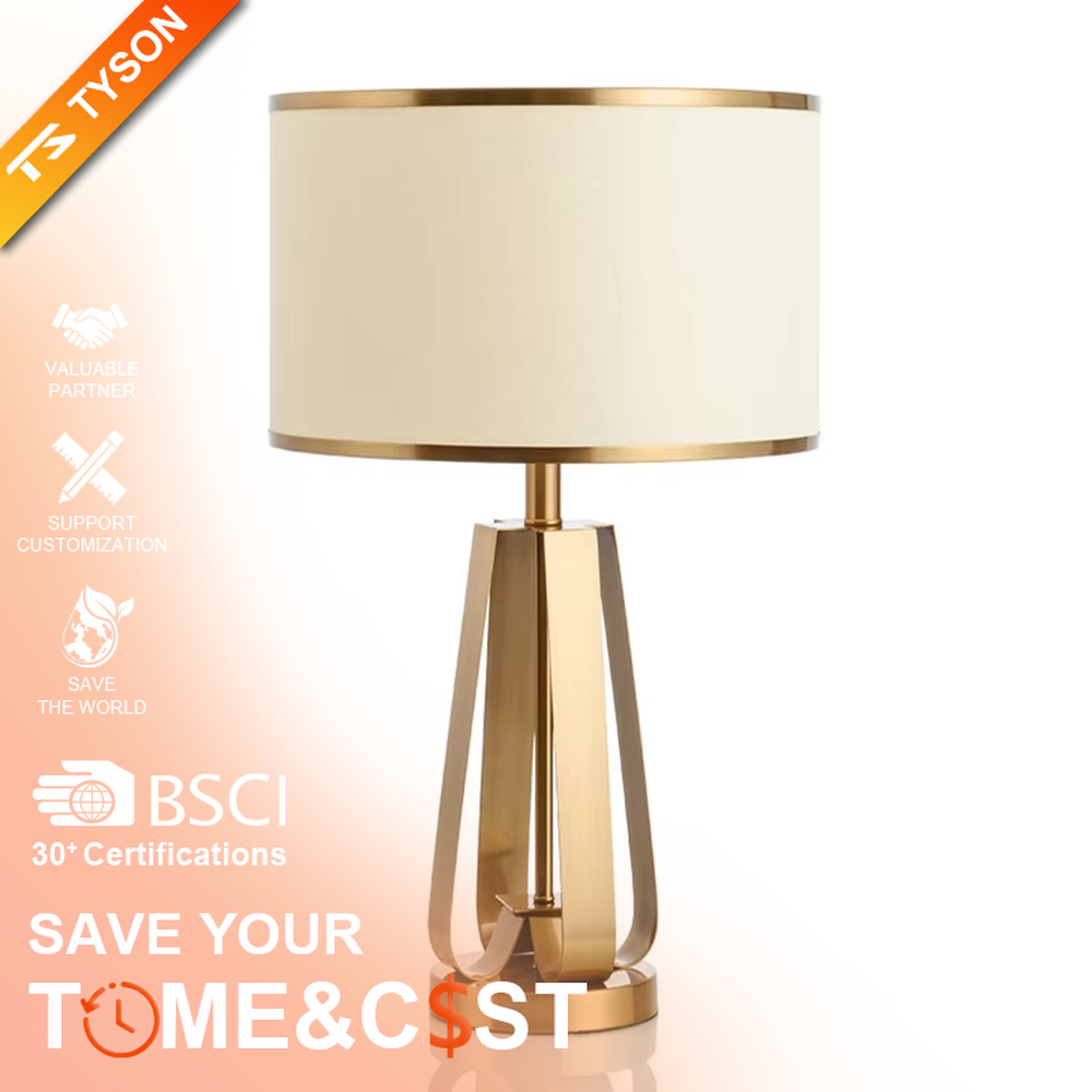 This is a light luxury geometric metal table lamp, featuring a gold polygonal hollow lamp base paired with an off-white fabric lampshade (with gold trim). It emits soft and warm light, serving both lighting and decorative purposes, suitable for bedroom nightstands, light luxury living room side tables, hotel guest rooms, showrooms and other scenarios.