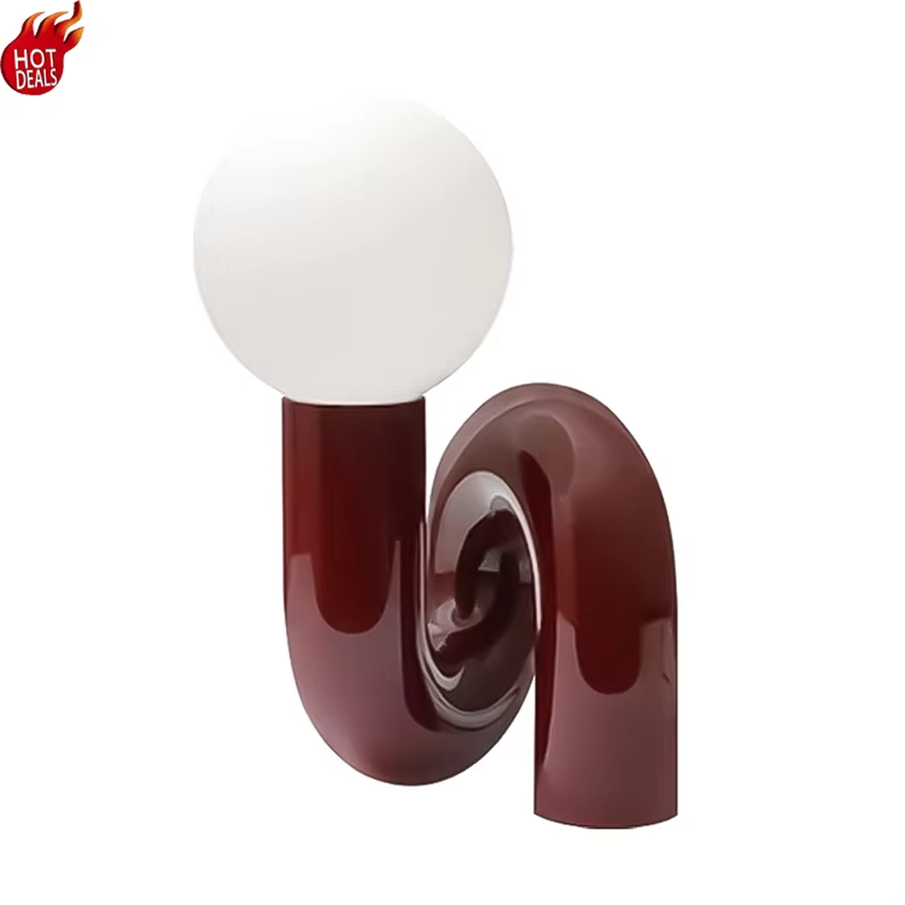 This art table lamp features a spiral S-shaped stand made of glossy wine-red material, paired with a milky white spherical lampshade, with a vivid and retro shape, serving both lighting and decorative purposes, ideal for bedrooms, living rooms, internet-famous shops and other spaces.