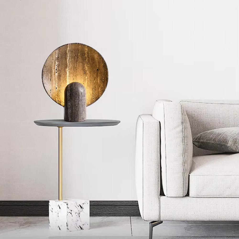 Industrial retro stone-texture base + circular metal texture lampshade table lamp, warm light effect, creating a rustic artistic atmosphere.