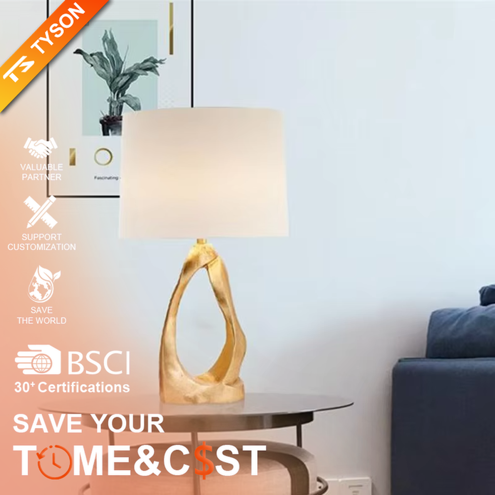 Light luxury art golden twisted hollow base table lamp, irregular metal texture base + beige fabric lampshade, soft warm light, creating a high-end artistic home atmosphere.