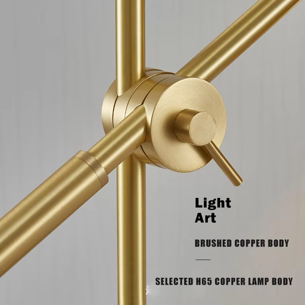 This is a modern light luxury style gold metal table lamp, featuring a spherical lampshade paired with an adjustable long arm and a stable base, which has both lighting and decorative functions, suitable for bedroom nightstands, study desks, hotel guest rooms and other spaces.