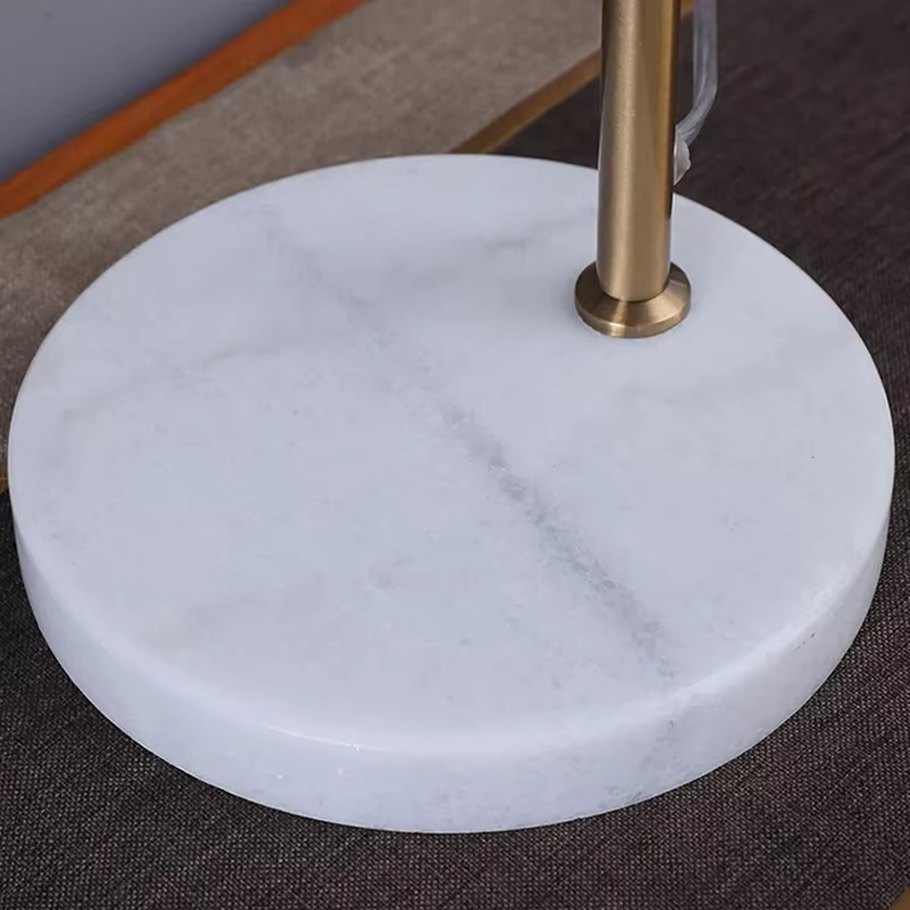 Modern light luxury golden metal curved-arm cylinder head table lamp, white marble base + warm light effect, creating an exquisite minimalist home atmosphere.