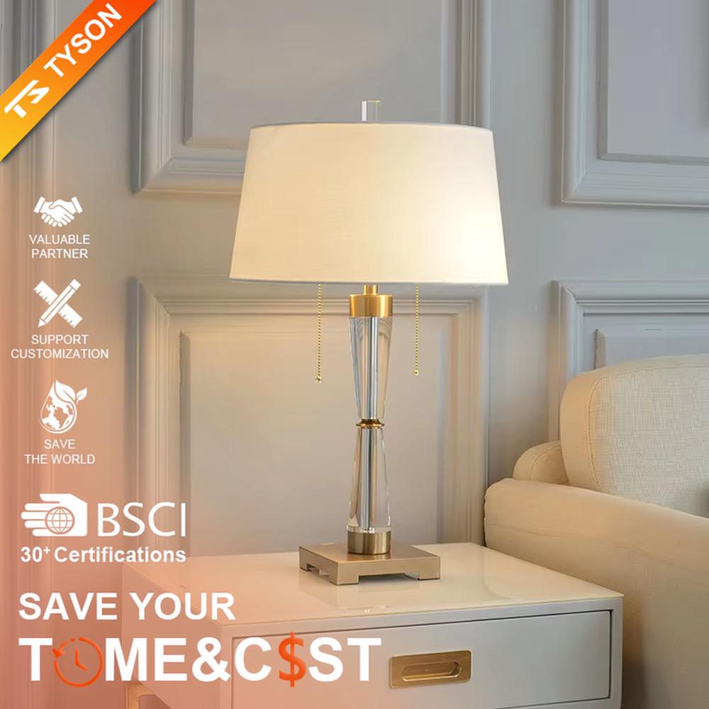 Modern light luxury fabric table lamp, with an off-white fabric lampshade paired with a transparent acrylic + gold metal spliced conical lamp pole, a gold square base with a double pull-cord switch, emitting soft and warm light, combining decorativeness and practicality, suitable for lighting and decoration in spaces such as bedroom nightstands, living room side tables, and hotel guest rooms.