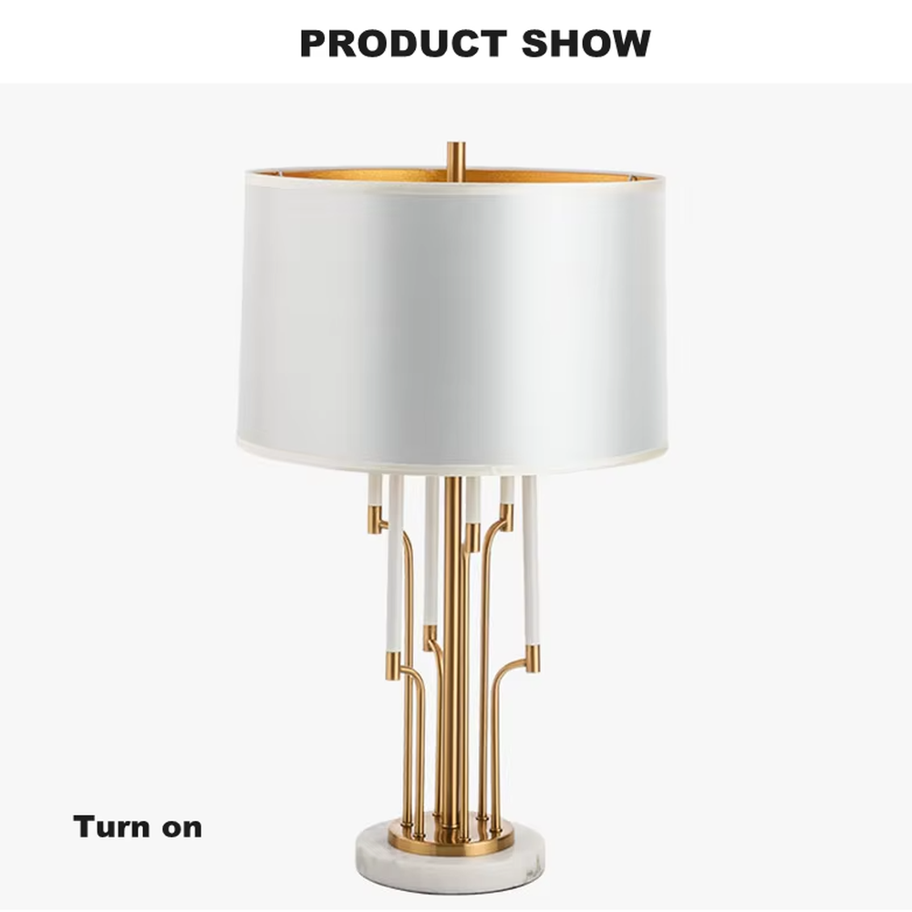 Luxury multi-pole metal table lamp (gold pole + white shade + marble base), warm light effect, creating an elegant and high-end light luxury space atmosphere.