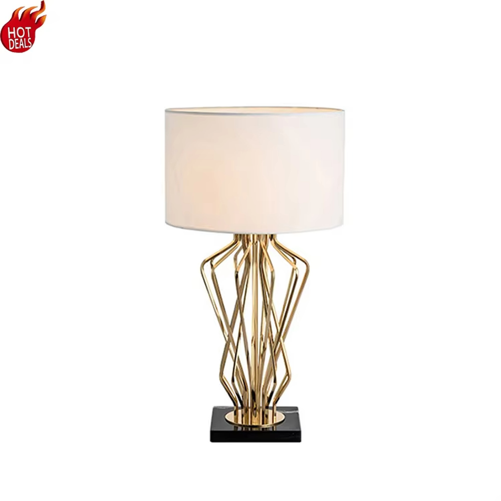 Modern art golden geometric line table lamp (white shade + black base), warm light effect, creating a high-end minimalist creative space atmosphere.