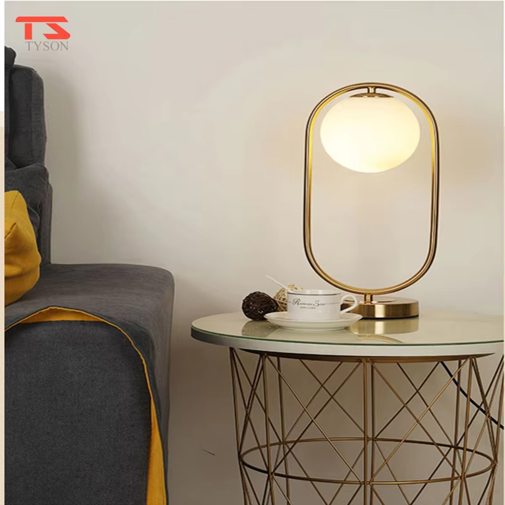 Modern minimalist oval-frame spherical table lamp, with a black metal oval frame paired with a milky white luminous bulb, emitting soft and even light, combining decorativeness and practicality, suitable for lighting and decoration in spaces such as bedroom nightstands, living room side tables, and office desks.