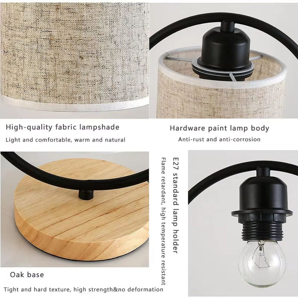 This is a modern minimalist oval frame table lamp, with a black metal oval stand paired with a beige linen lampshade and a solid wood base, featuring both decorative and lighting functions, ideal for warm indoor scenarios such as bedroom nightstands and living room side tables.