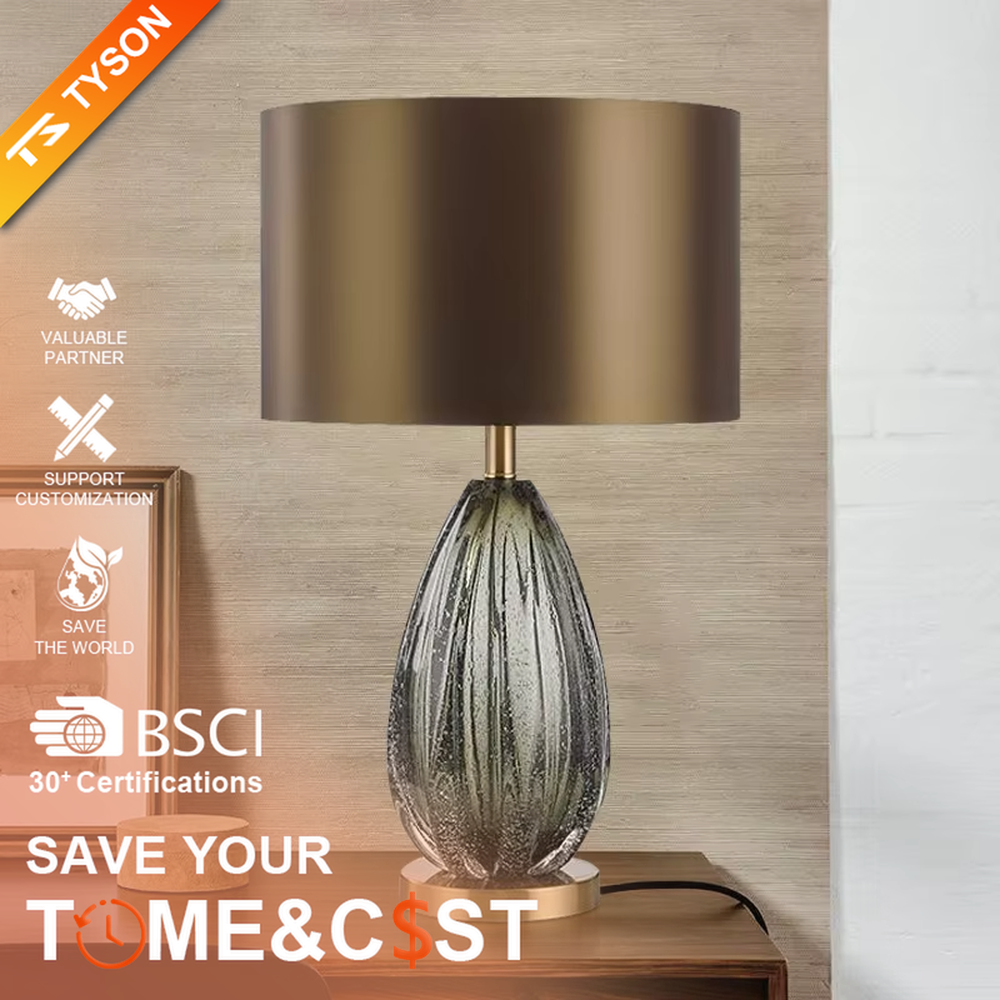 Light luxury textured glass table lamp (dark green glass + metal base), warm light effect, creating an elegant and high-end home space atmosphere.