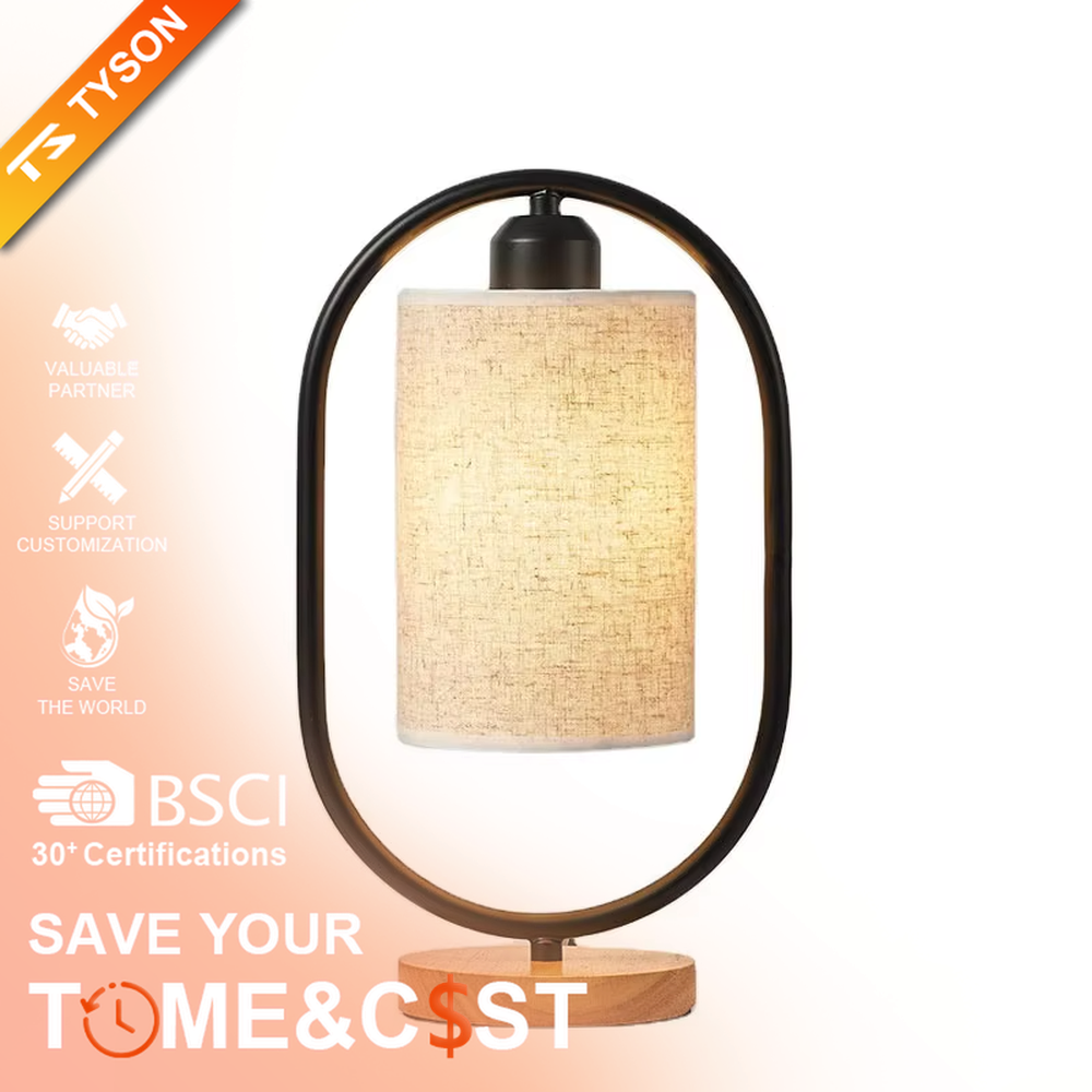 Modern minimalist silver oval metal frame linen texture lampshade wooden base table lamp, warm light effect, creating a cozy minimalist home atmosphere.