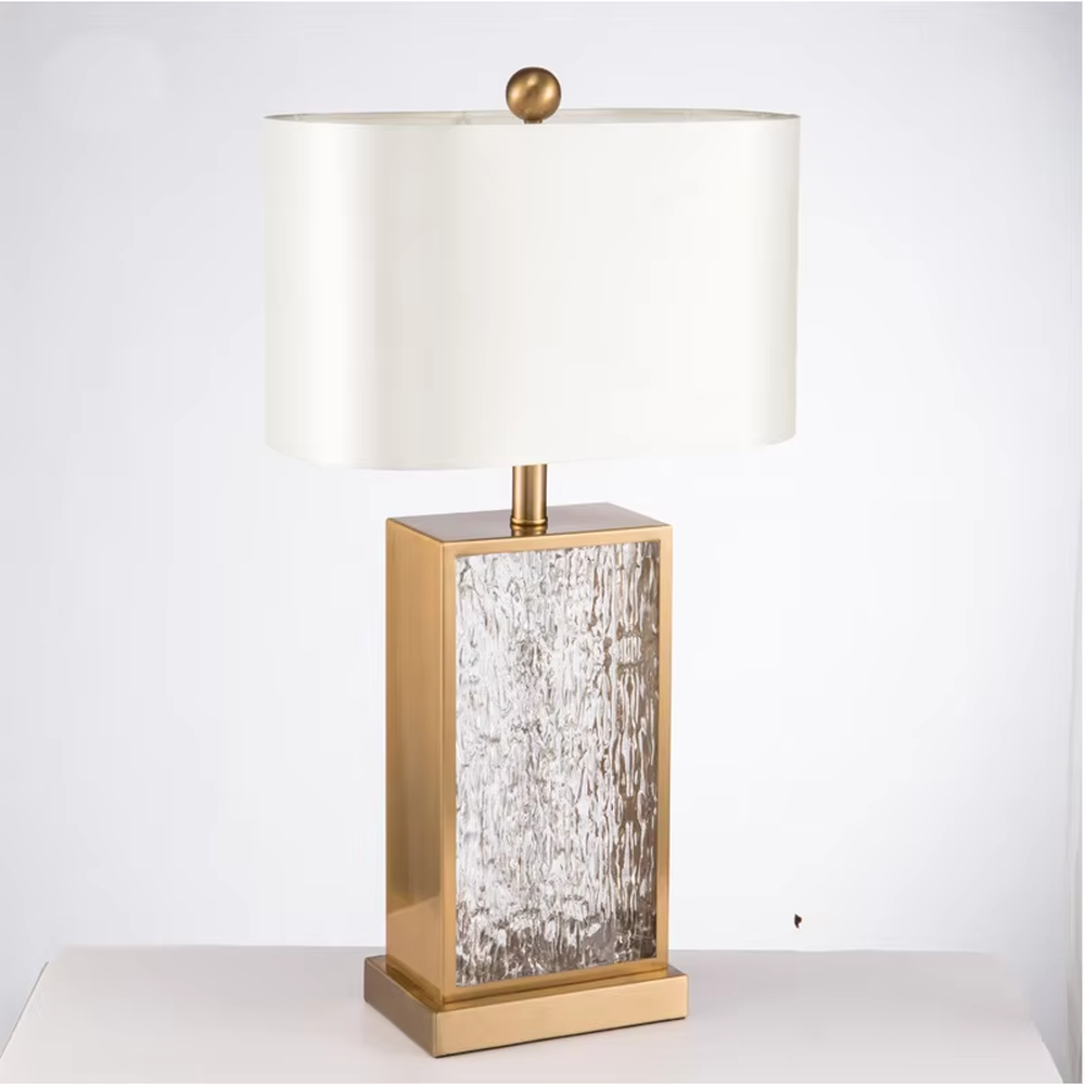 Light luxury golden frame ice-textured glass square table lamp (satin white shade), warm light effect, creating an exquisite and high-end space atmosphere.