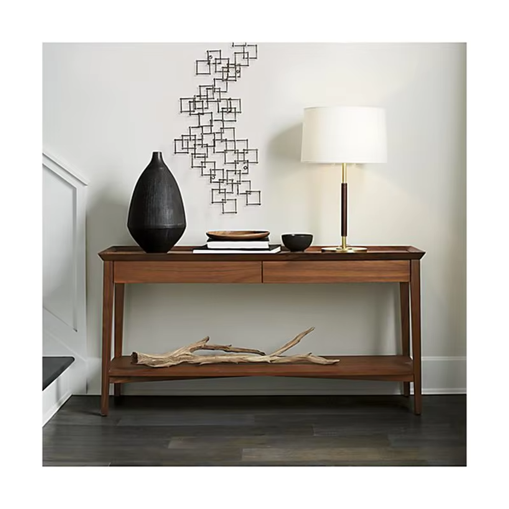 This is a minimalist light luxury table lamp, featuring an off-white linen fabric lampshade paired with a black and gold dual-color metal lamp pole, with a pull-chain switch. It emits soft and warm light, serving both lighting and decorative purposes, suitable for bedroom nightstands, living room side tables, studies, hotel guest rooms and other scenarios.