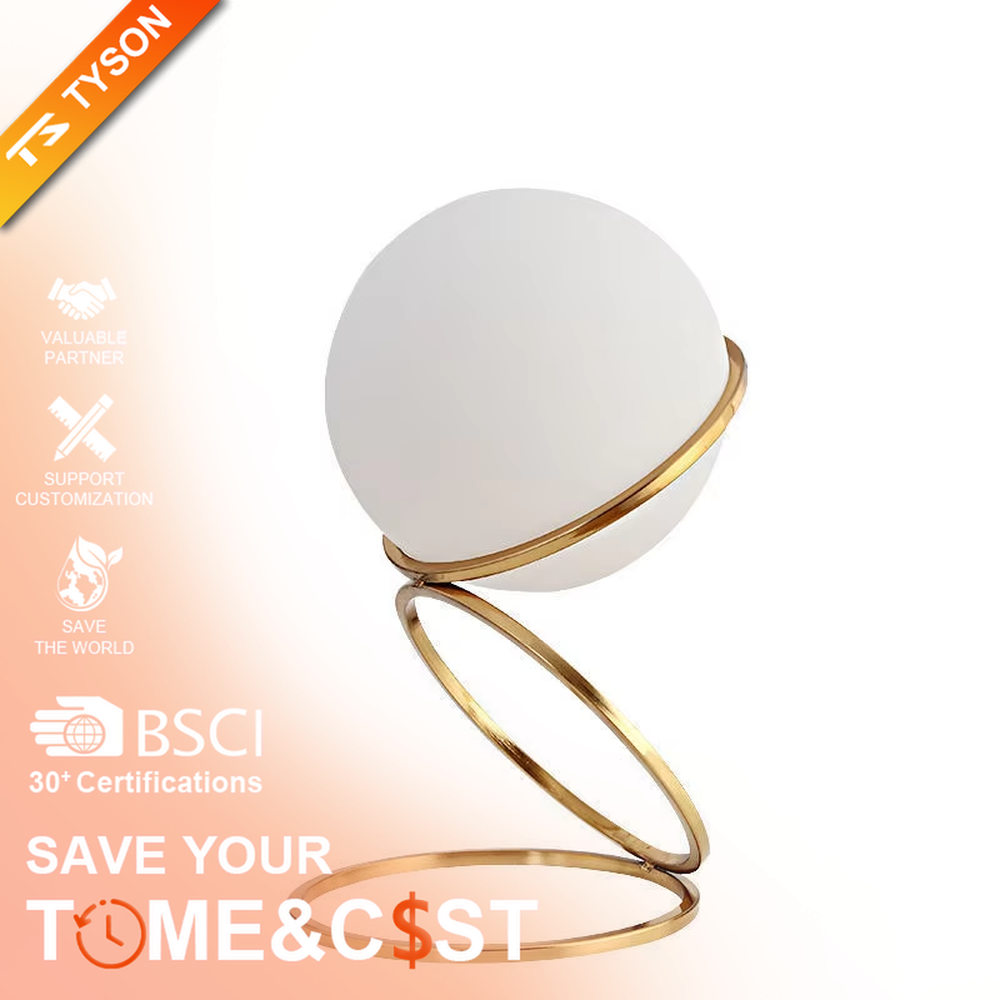 Modern planet orbit-shaped table lamp (white ball + gold ring stand), warm light effect, creating a sci-fi artistic minimalist space atmosphere.