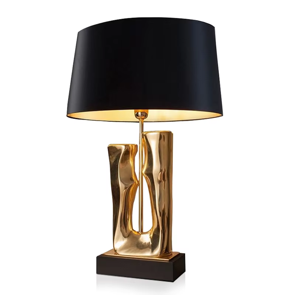 Modern art luxury black-gold sculpture base table lamp, golden streamlined sculpture base + black shade with gold lining + warm light effect, creating a high-end artistic luxury atmosphere.