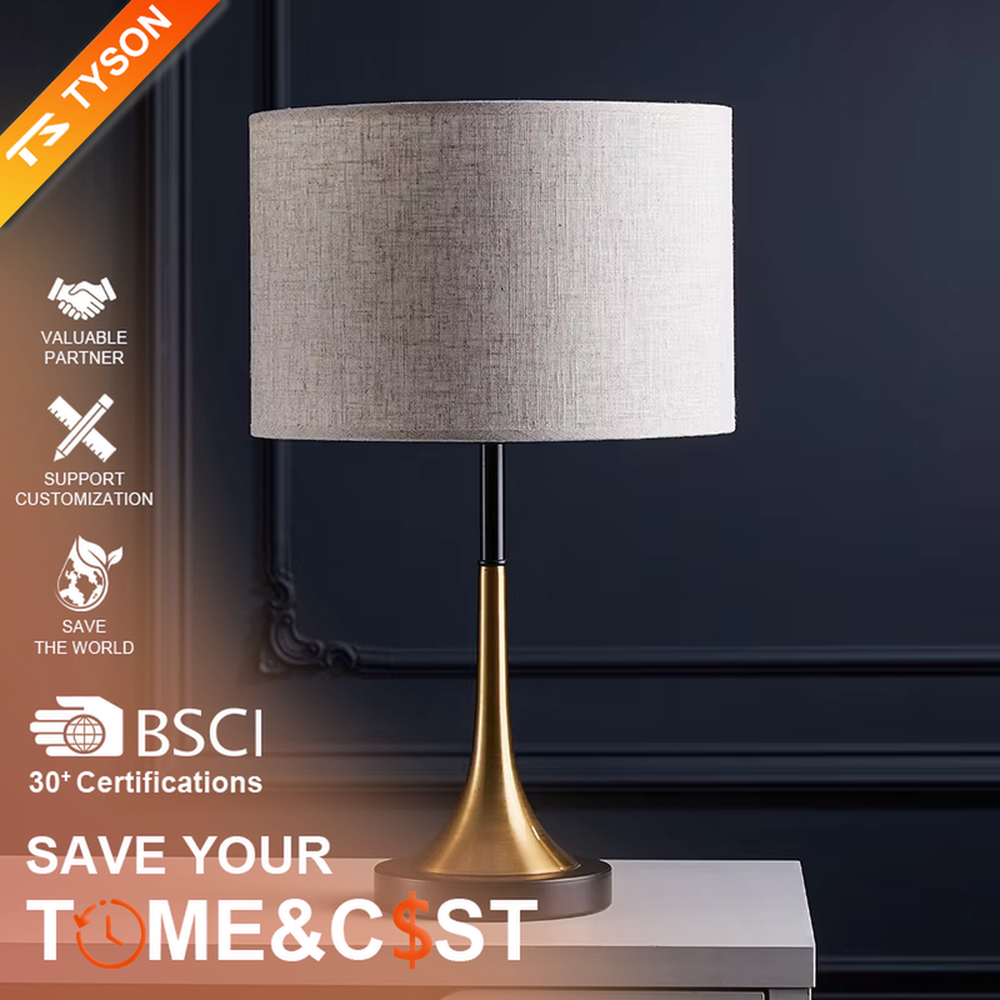 This modern light luxury table lamp features a black fabric cylindrical lampshade, paired with a black and gold contrasting metal lamp pole. The lower part is a trumpet-shaped gold metal design, and the base is black. The overall style is simple and elegant, with soft, non-glaring light, serving both lighting and decorative purposes, suitable for bedrooms, studies, living rooms and other spaces.
