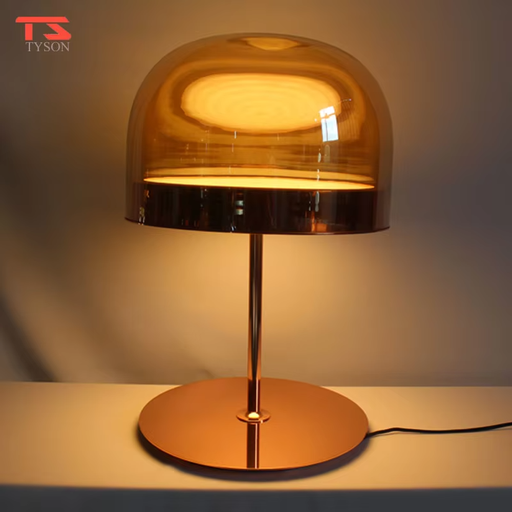 Modern light luxury amber glass dome copper base table lamp, warm light effect, creating an elegant retro space atmosphere.