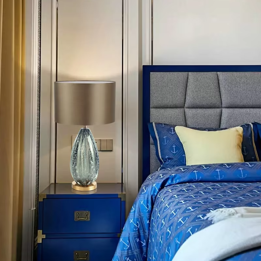 Light luxury black crystal fabric shade table lamp (black crystal texture base + coffee fabric shade), warm light effect, creating a calm and high-end home atmosphere.