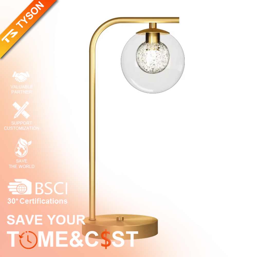 Modern light luxury golden curved pole transparent glass ball shade glitter bulb table lamp, warm light effect, creating a minimalist exquisite atmosphere.