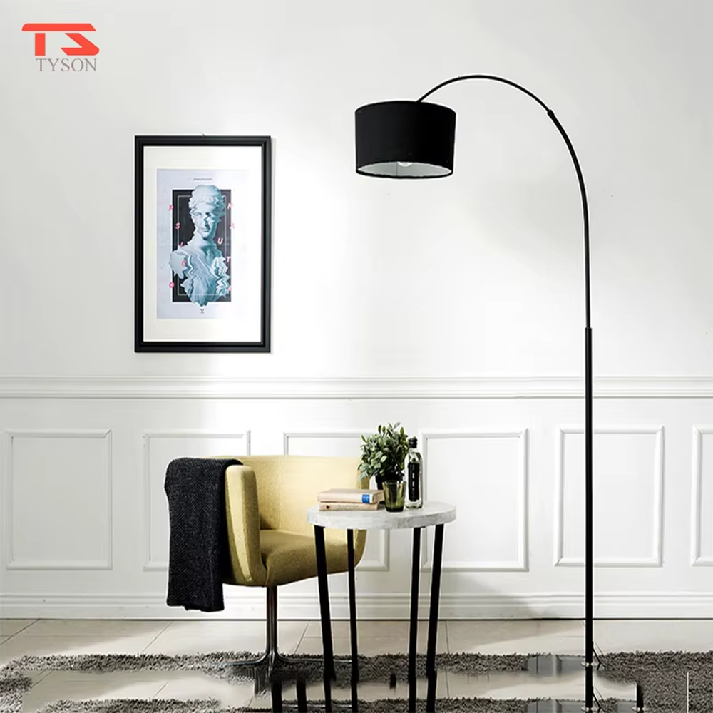 This is a modern minimalist arc floor lamp, featuring a white metal arc pole, a marble base, and a white fabric lampshade, with a simple and elegant design. It is used to provide local lighting and decorate the space, combining practicality and aesthetics. It is suitable for modern home living room corners, bedroom reading areas, high-end hotel leisure areas, luxury apartment living spaces and other places.